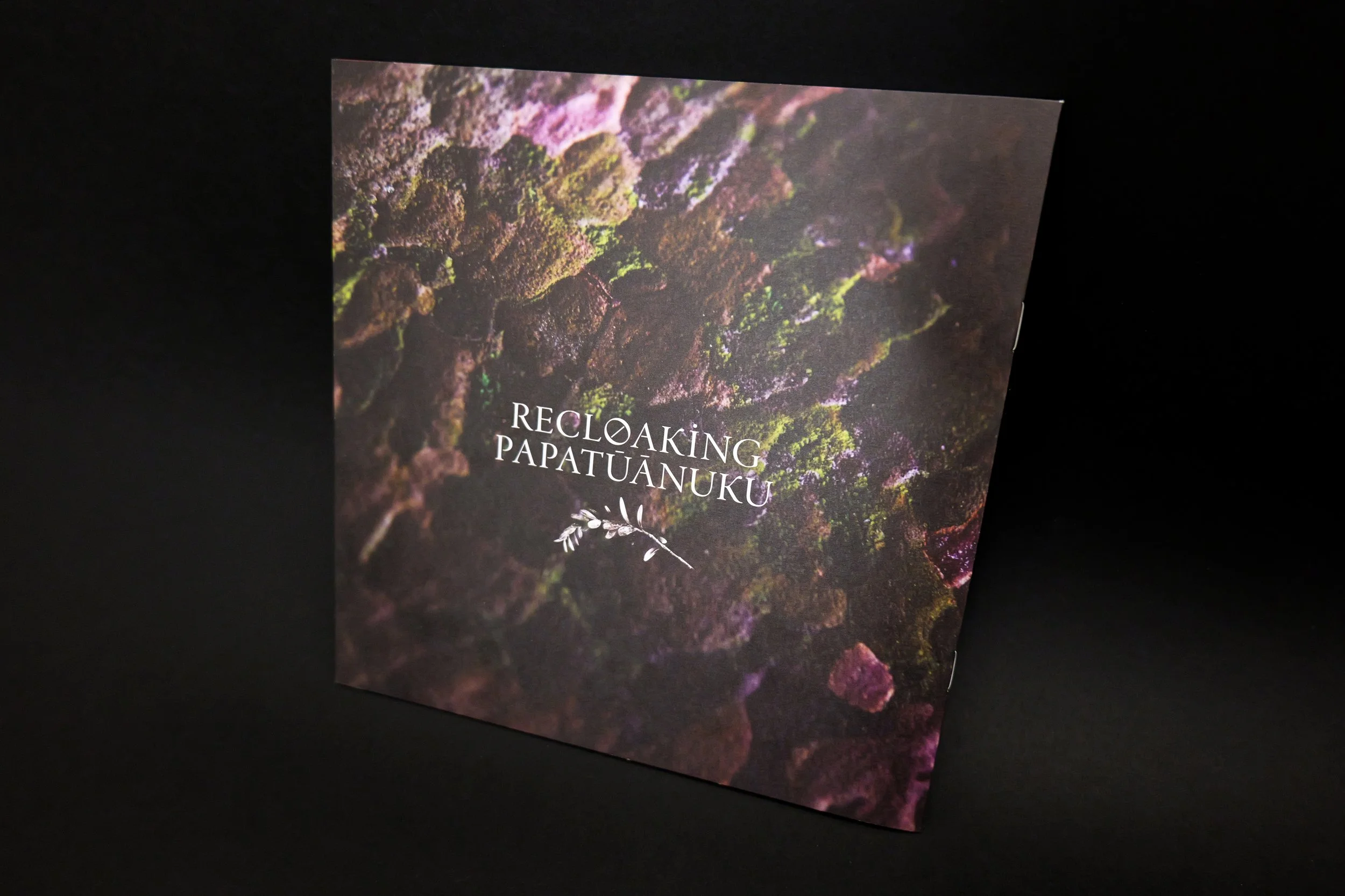 recloaking papatuanuku back-cover.jpg