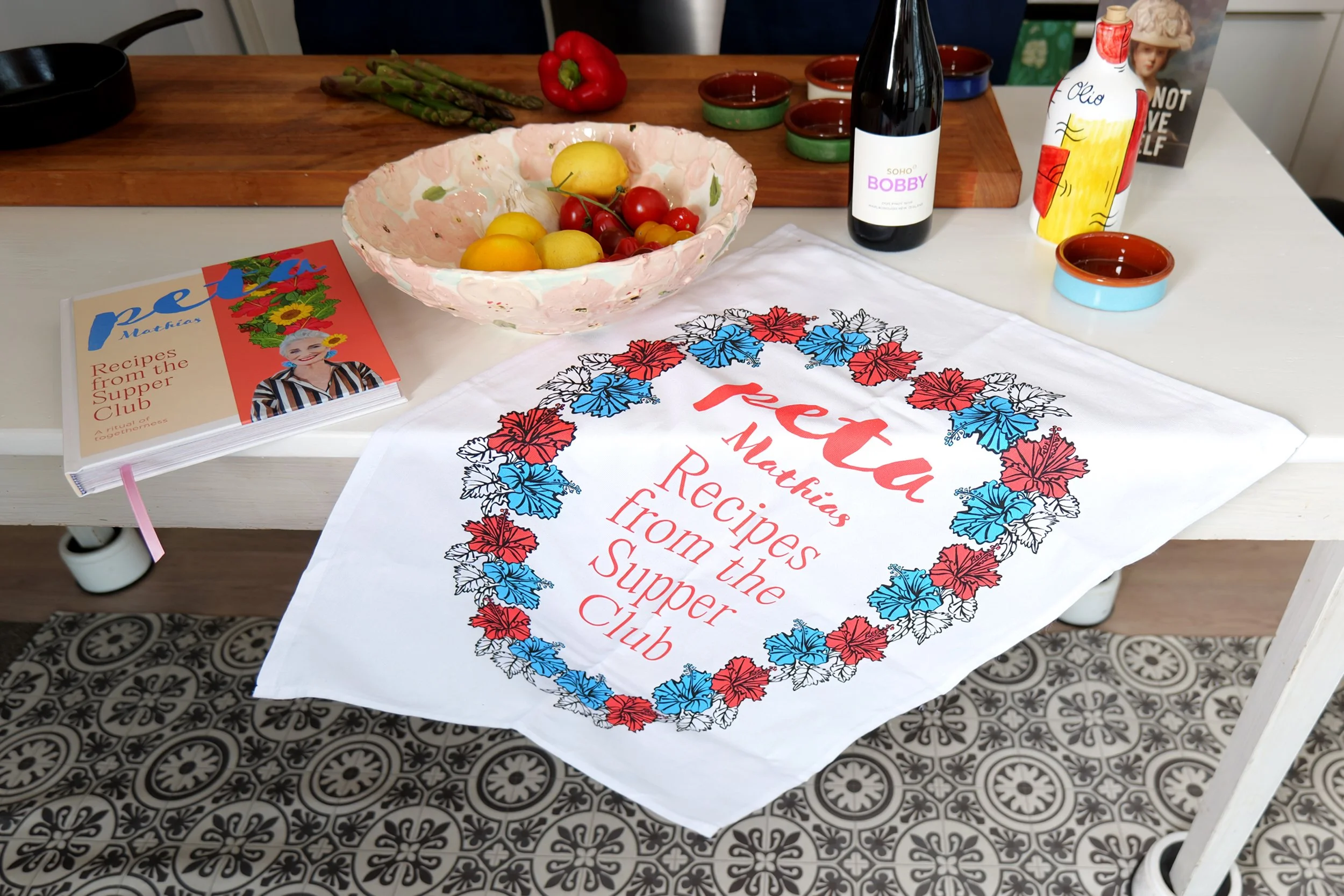 Peta Mathias tea towel and book 2.jpg