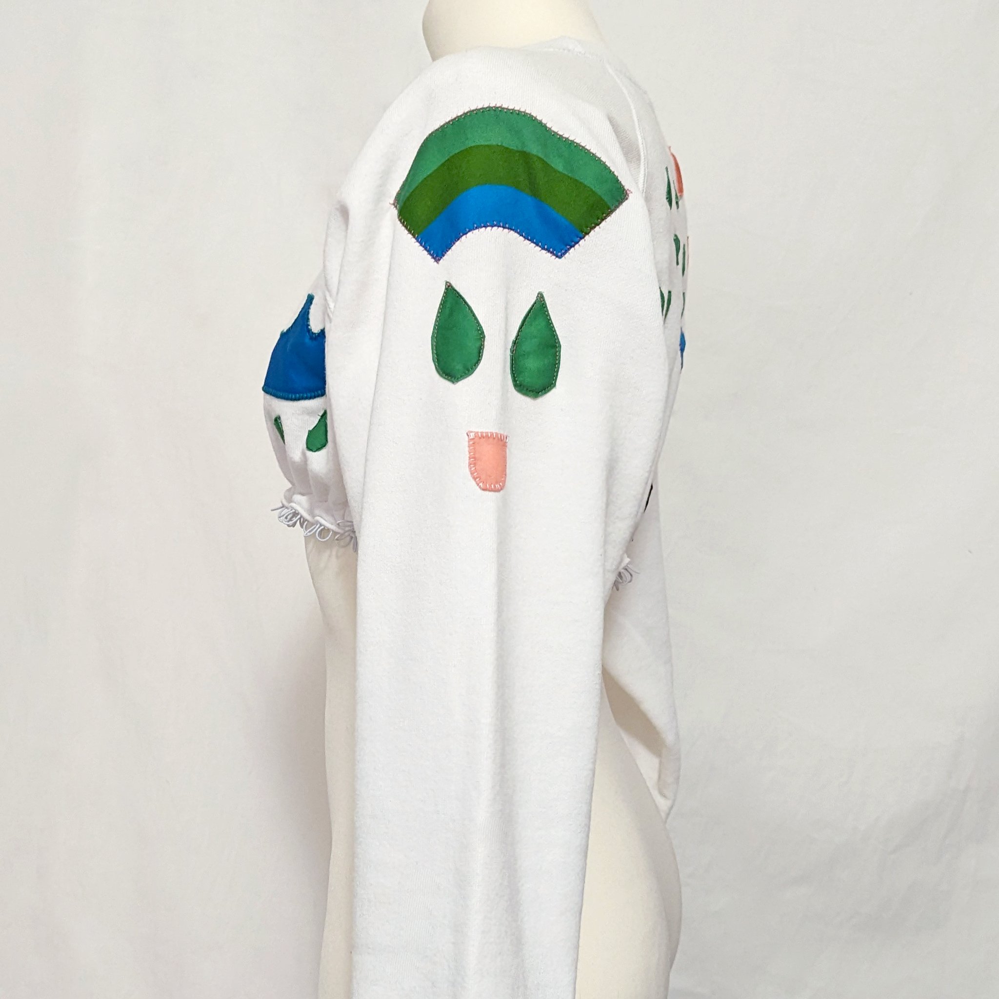 ncreatrix-patch-sweater-cropped-side.jpeg