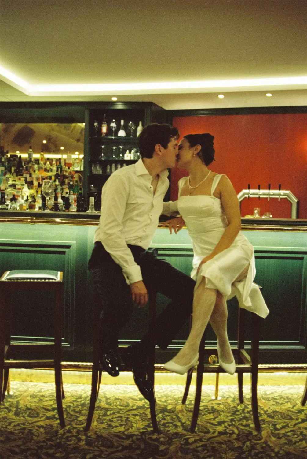 film-ending.jpg	The final shot: the couple sharing a kiss while sitting at the bar, an honest and intimate end to the story.