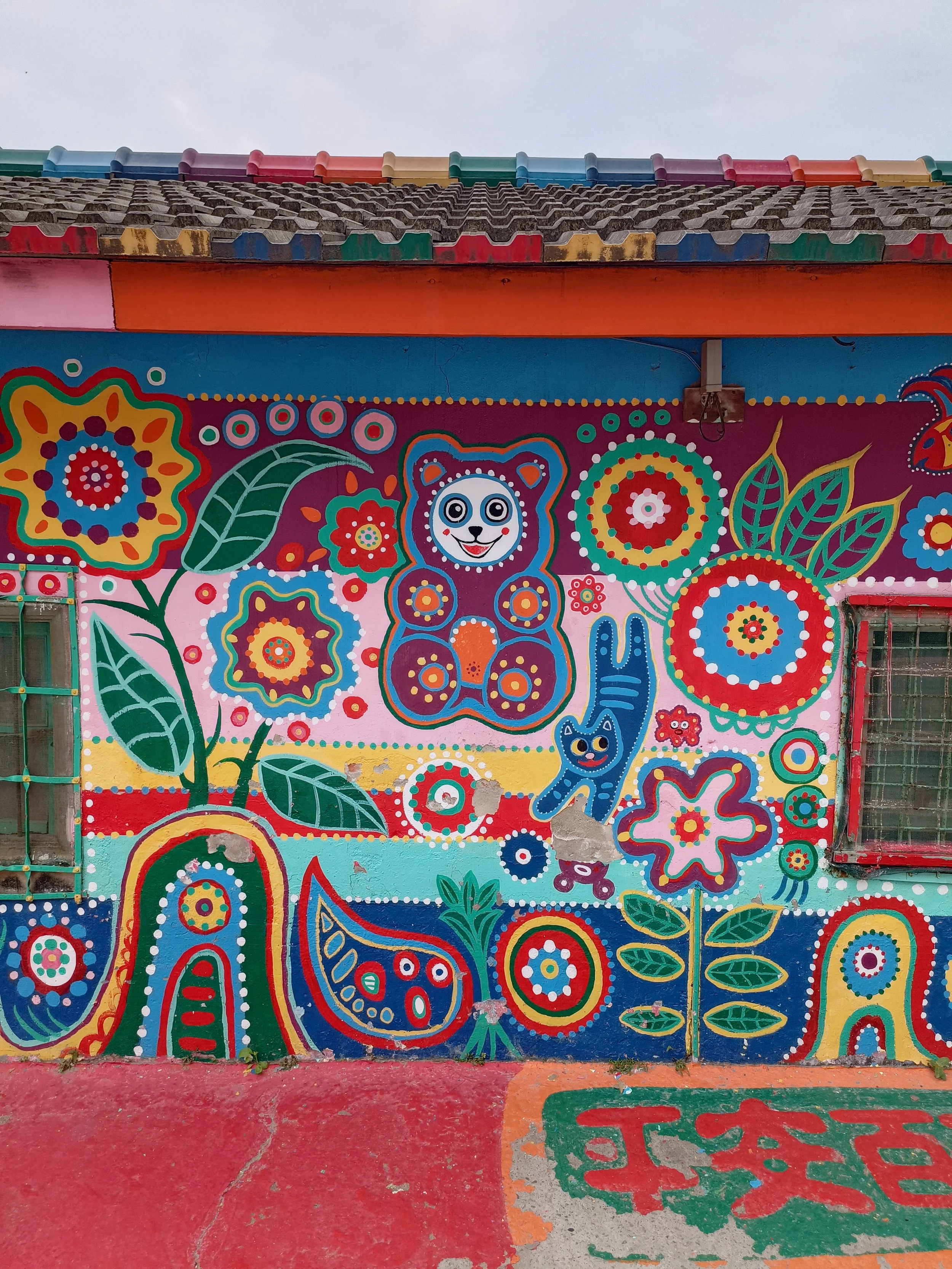 rainbow village in taiwan with hand painted colourful and vivid paintings on the wall at the art and cultural place