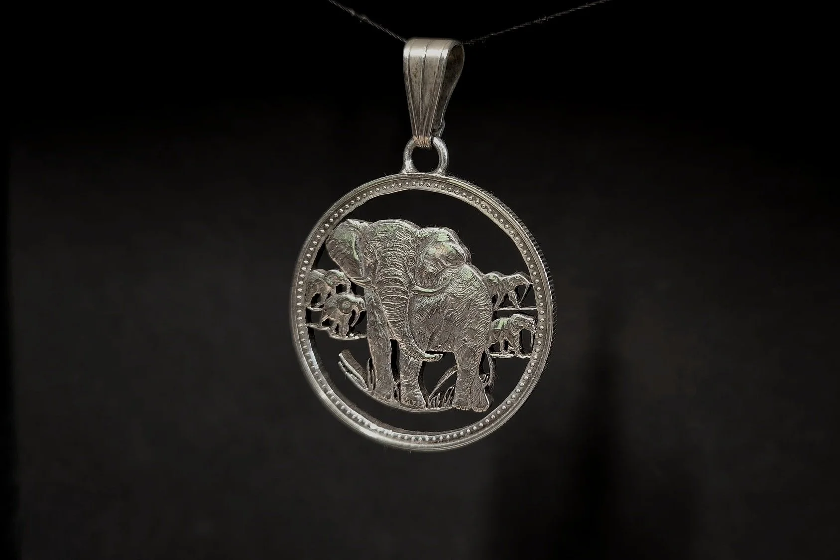 ausgesägte Münze, Elefantenherde, Silber