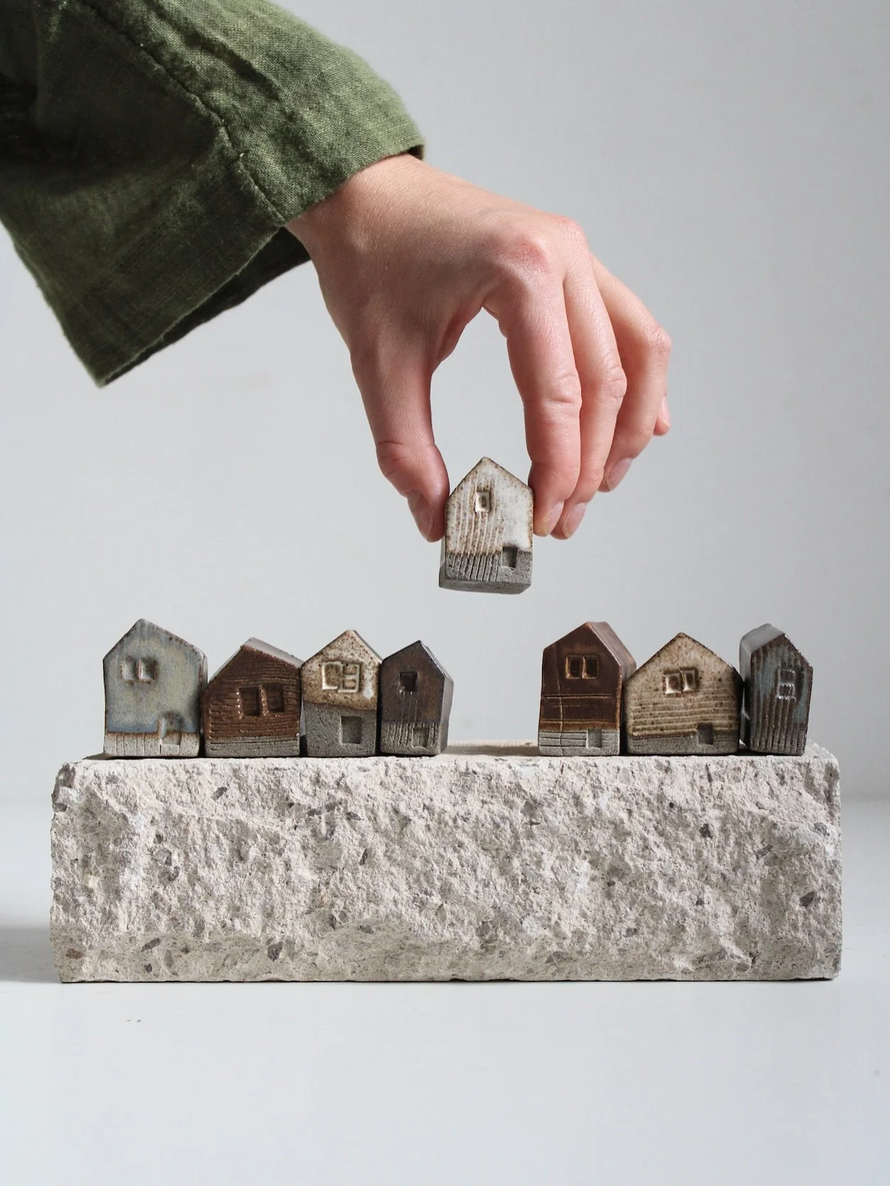 These wee houses used to be just a kiln filler. I&rsquo;d tuck them between bigger pots to make sure no space was wasted. But something changed this summer - I started to really love making them, creating tiny villages, and testing new textures on th