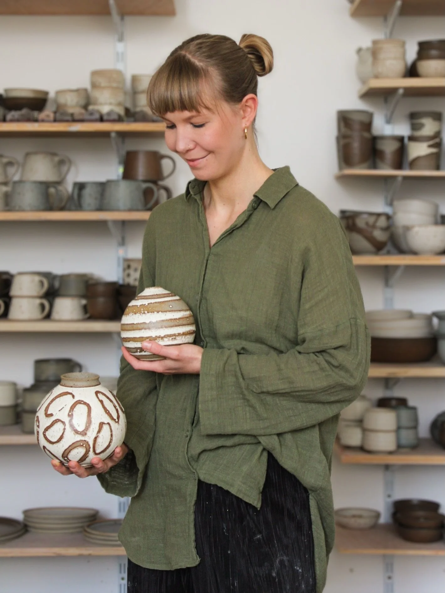 It&rsquo;s been a while, so here is a quick hello and a photo of me with my new babies (did I open the kiln at 300&deg;C? Guilty again). 

My name is Agata, and I&rsquo;m a Polish ceramicist based in Edinburgh, Scotland. I opened my studio five years