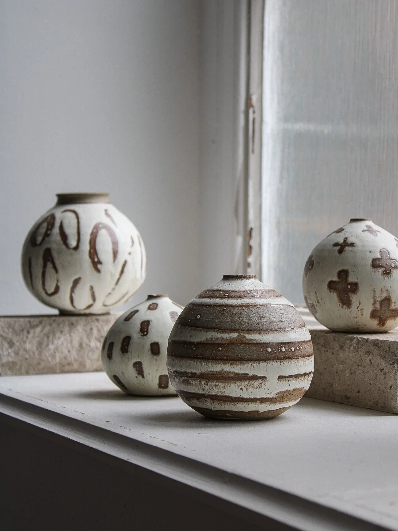 Introducing my newest vases. I&rsquo;ve found so much joy in throwing these fuller, rounded shapes this month ☺️

#pottery #ceramics #vase #handmade #clay