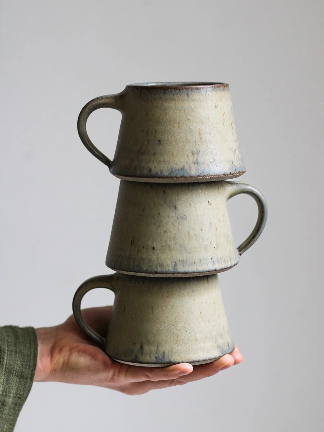 Just a stack of mugs in Loch ✨

#pottery #ceramics #mug #handmade #potterystudio