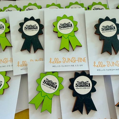 Wild Sauna Club branded badges (2).png