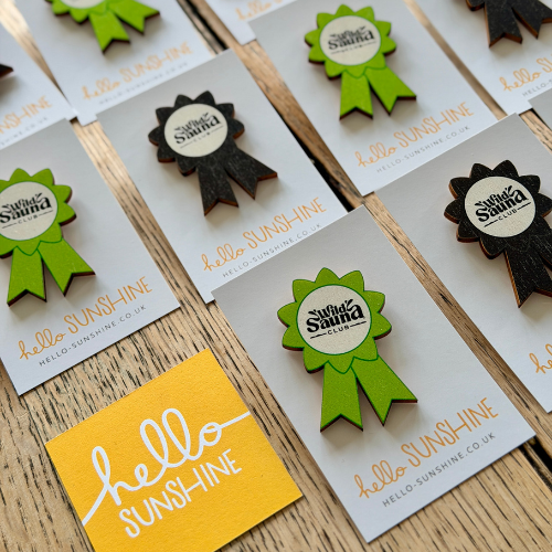 Wild Sauna Club branded badges (5).png