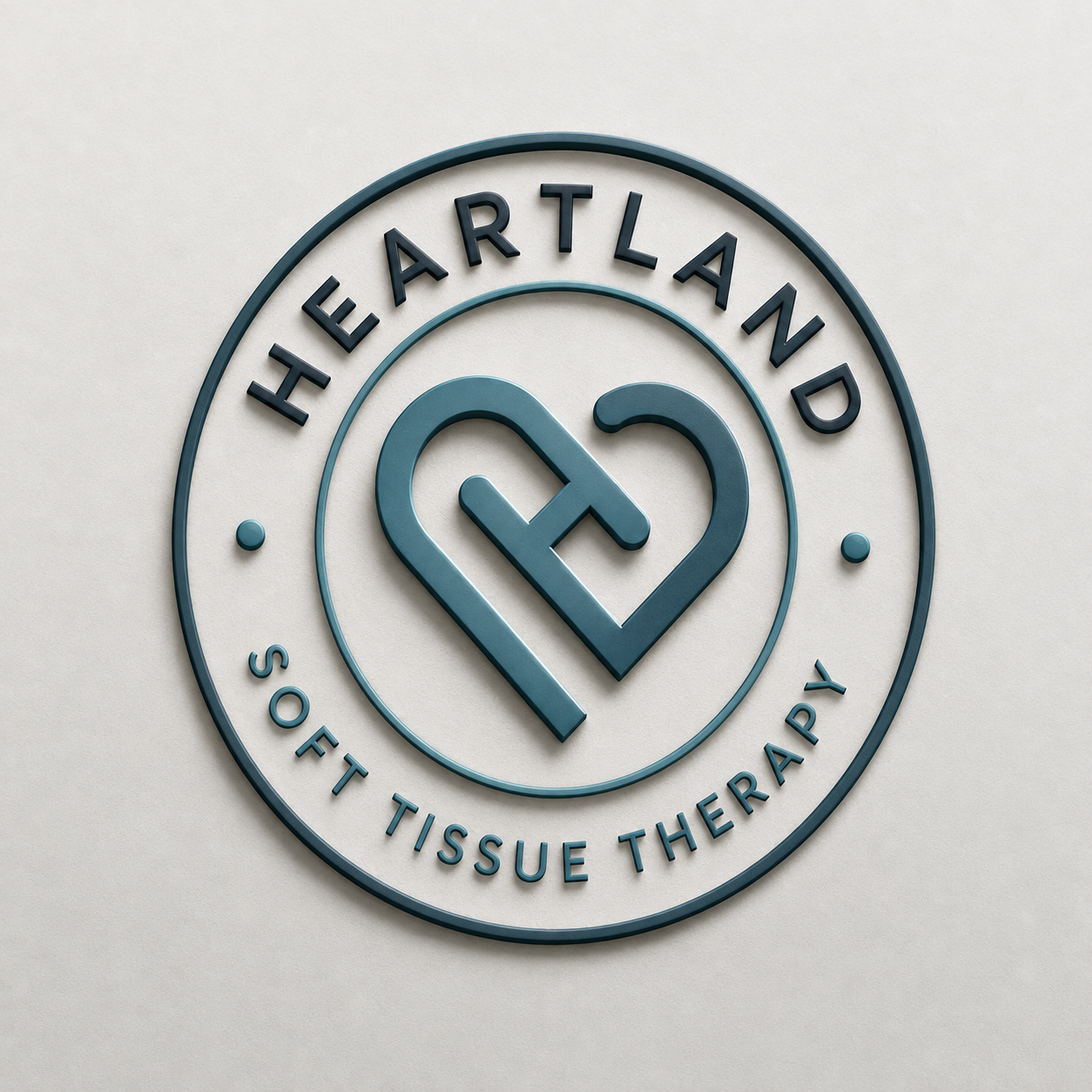Hearthland soft tissue therapy logo with a stylized heart shape in the center, surrounded by the text 'HEARTLAND' at the top and 'SOFT TISSUE THERAPY' at the bottom.