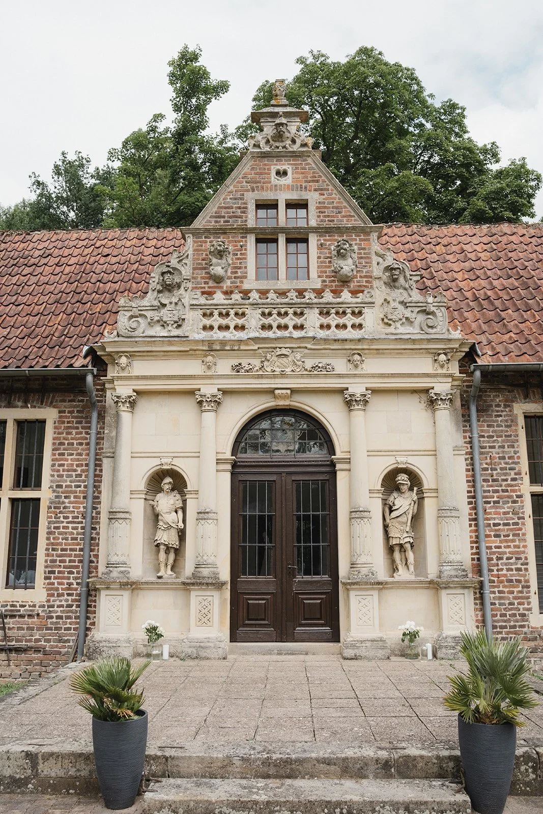 wedding venue exterior during a summer wedding celebration.jpg