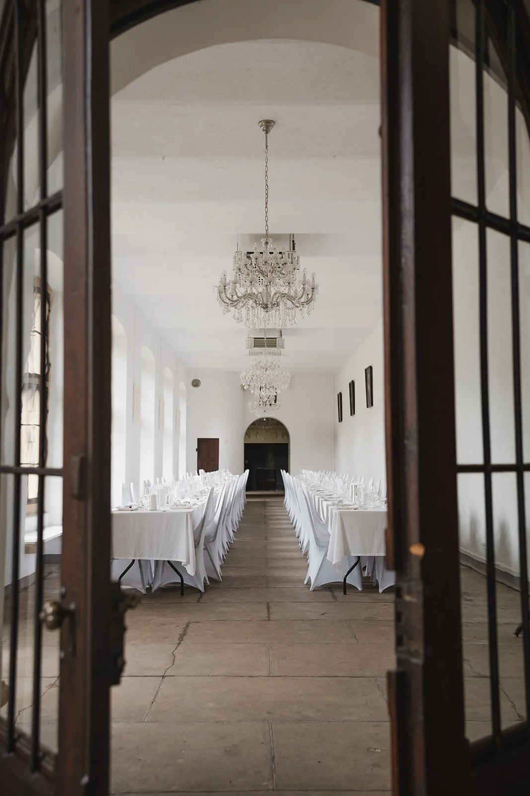 wedding venue exterior during a summer wedding celebration.jpg