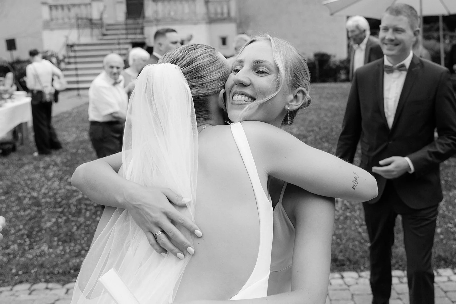 modern wedding photography capturing real moments between guests.jpg