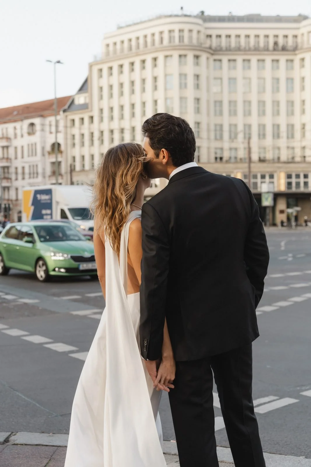Couple kissing on a Berlin street corner near Soho House