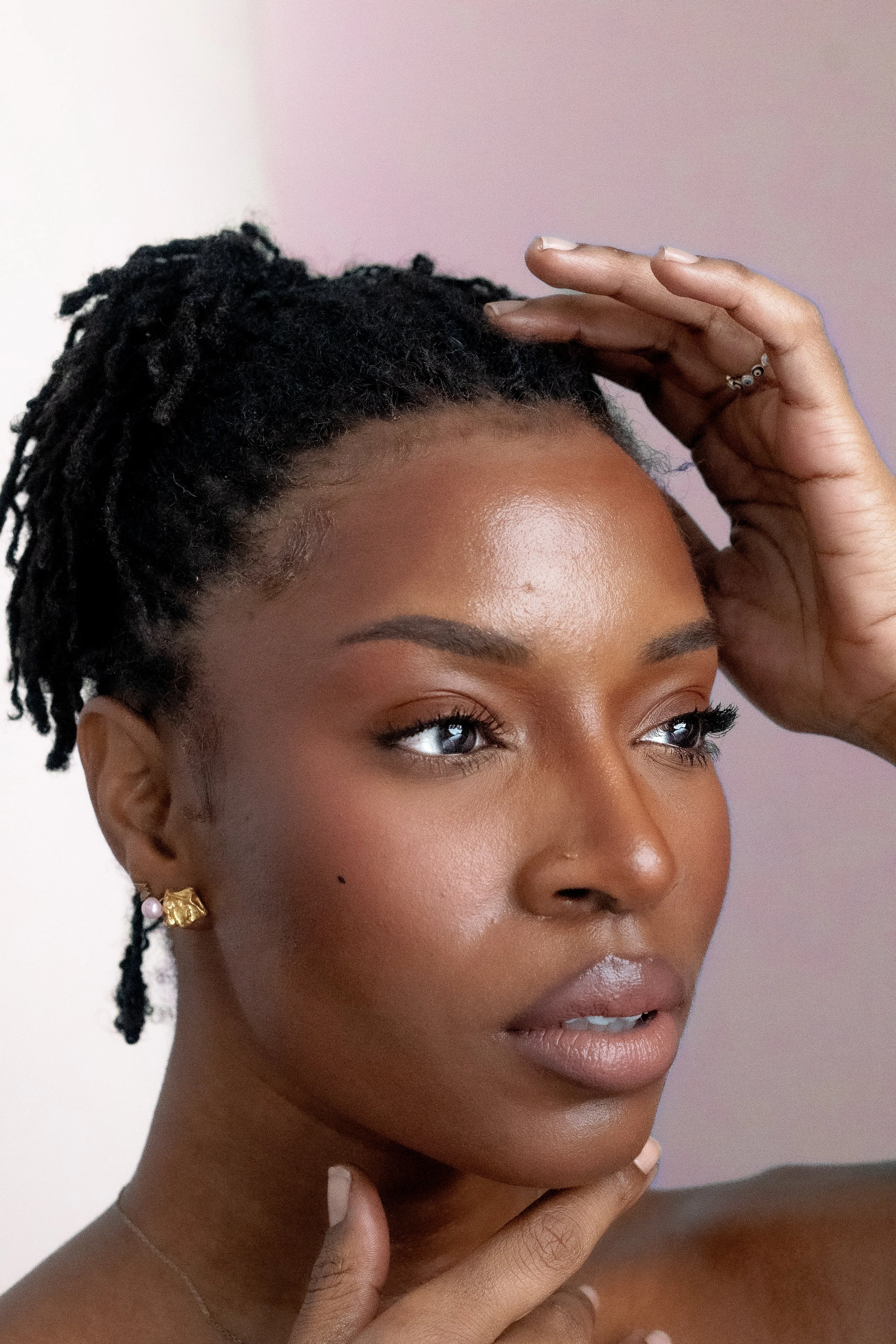African American Woman with locs beauty shot pink background.jpg