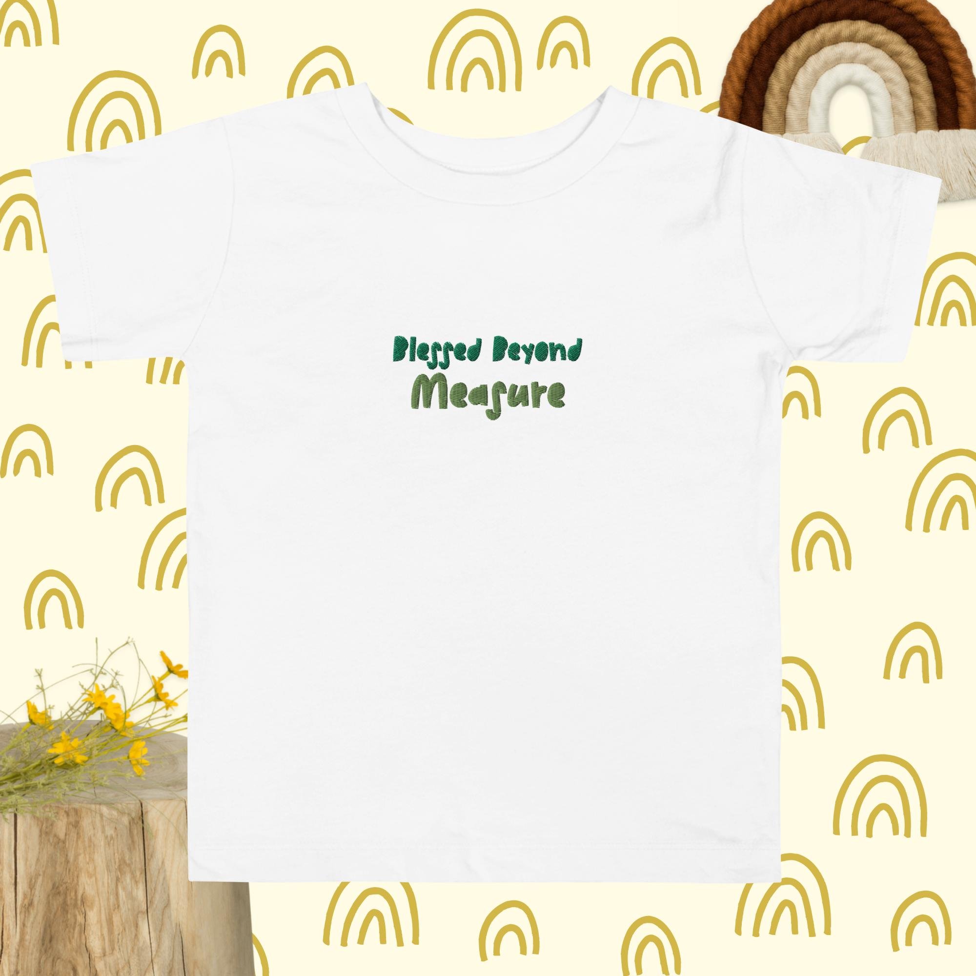 toddler-staple-tee-white-front-66d66f4e179fb.jpg