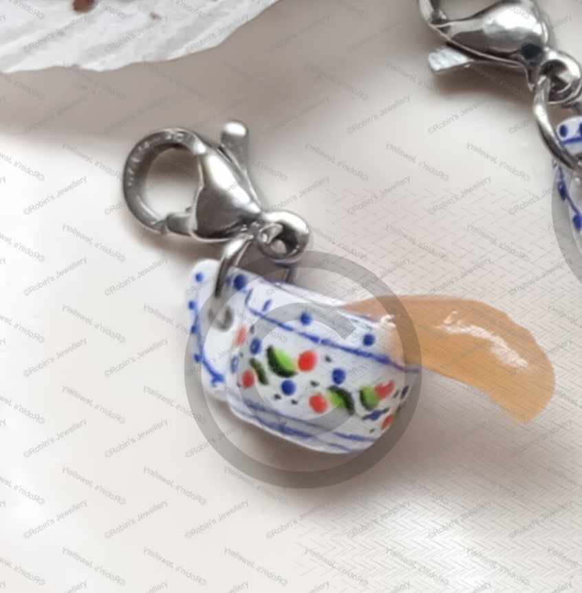 Tea Cup Charm Spilt © Option.png
