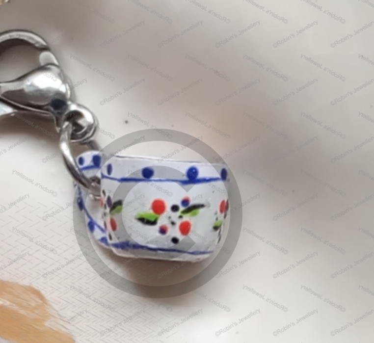 Tea Cup Charm Full © Option.png