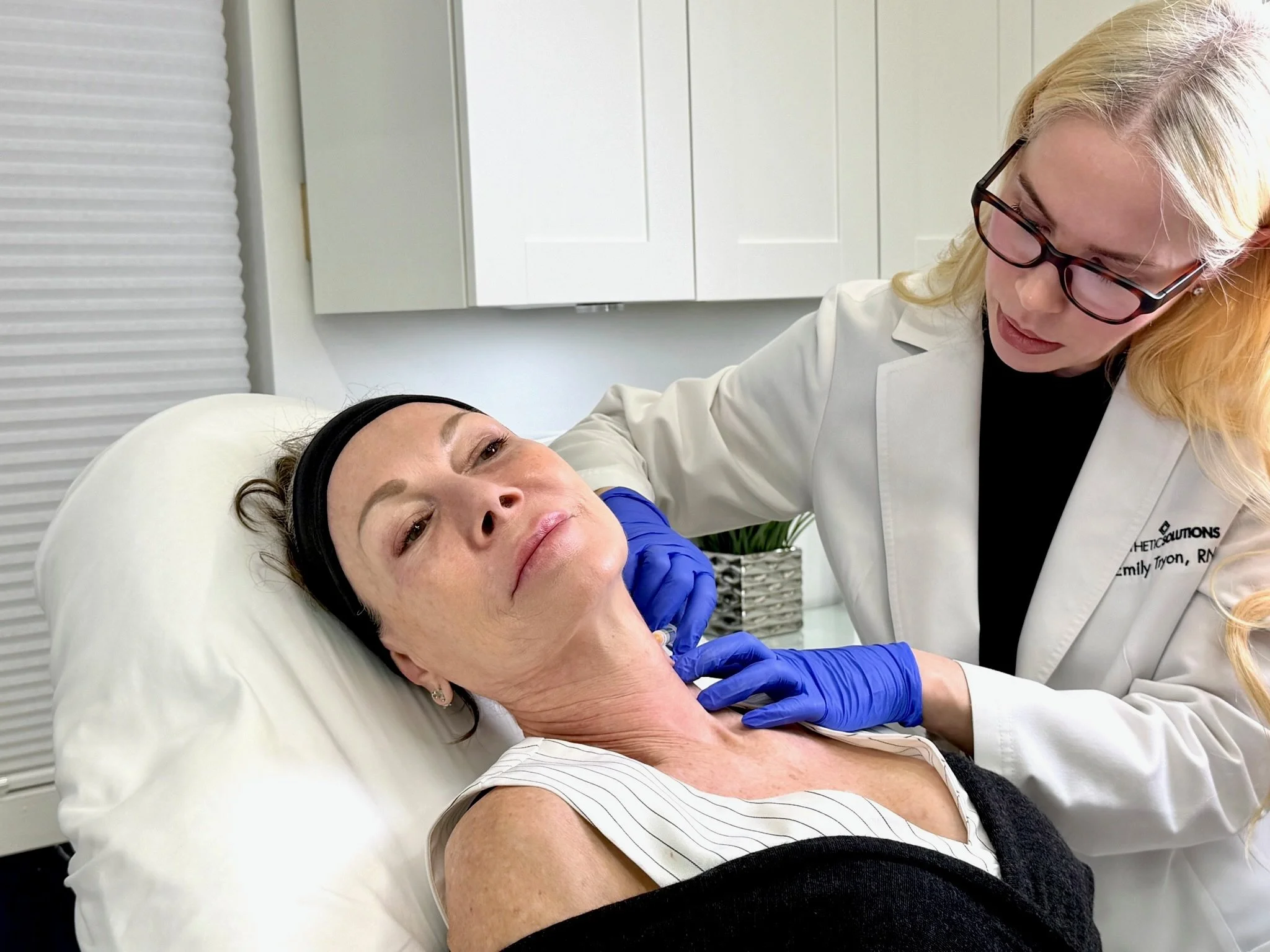Emily Tryon Performing PDGF Neck Rejuvenation on Client