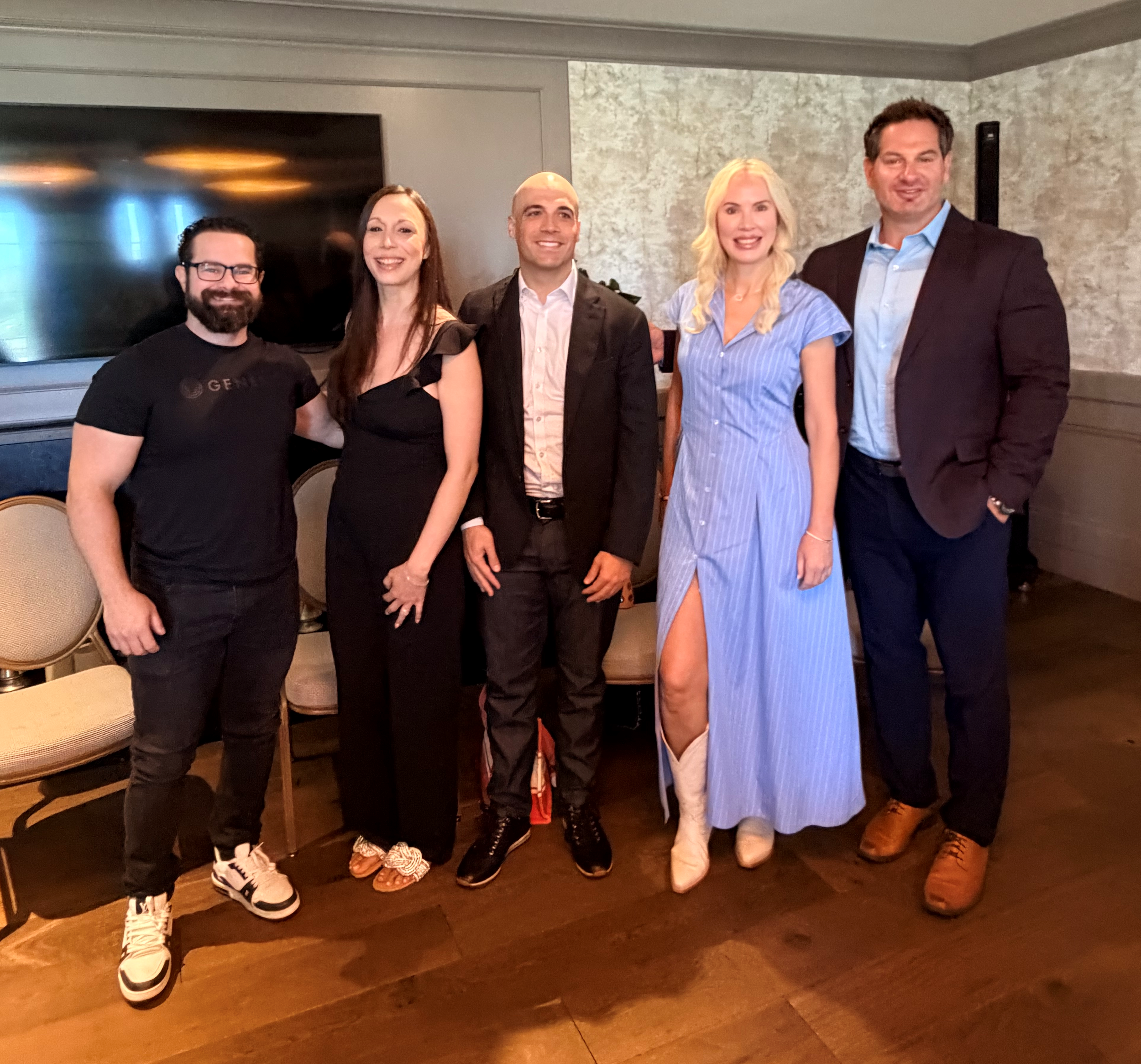 Emily Tryon RN Standing with Industry Expert Panelists from Elevate Aesthetics