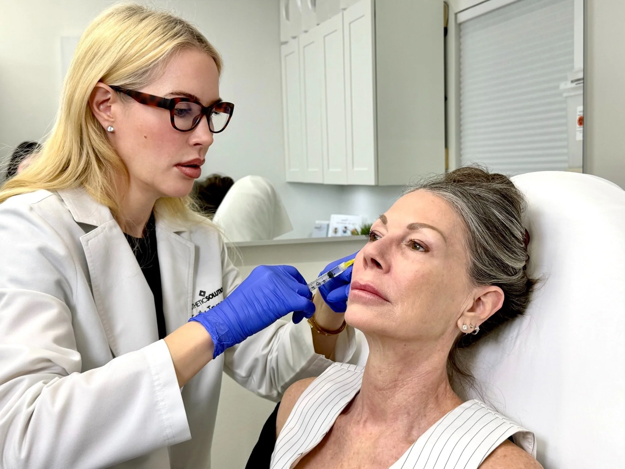 Emily Tryon Injecting PDGF Under Eyes on Esthetic Solutions Client