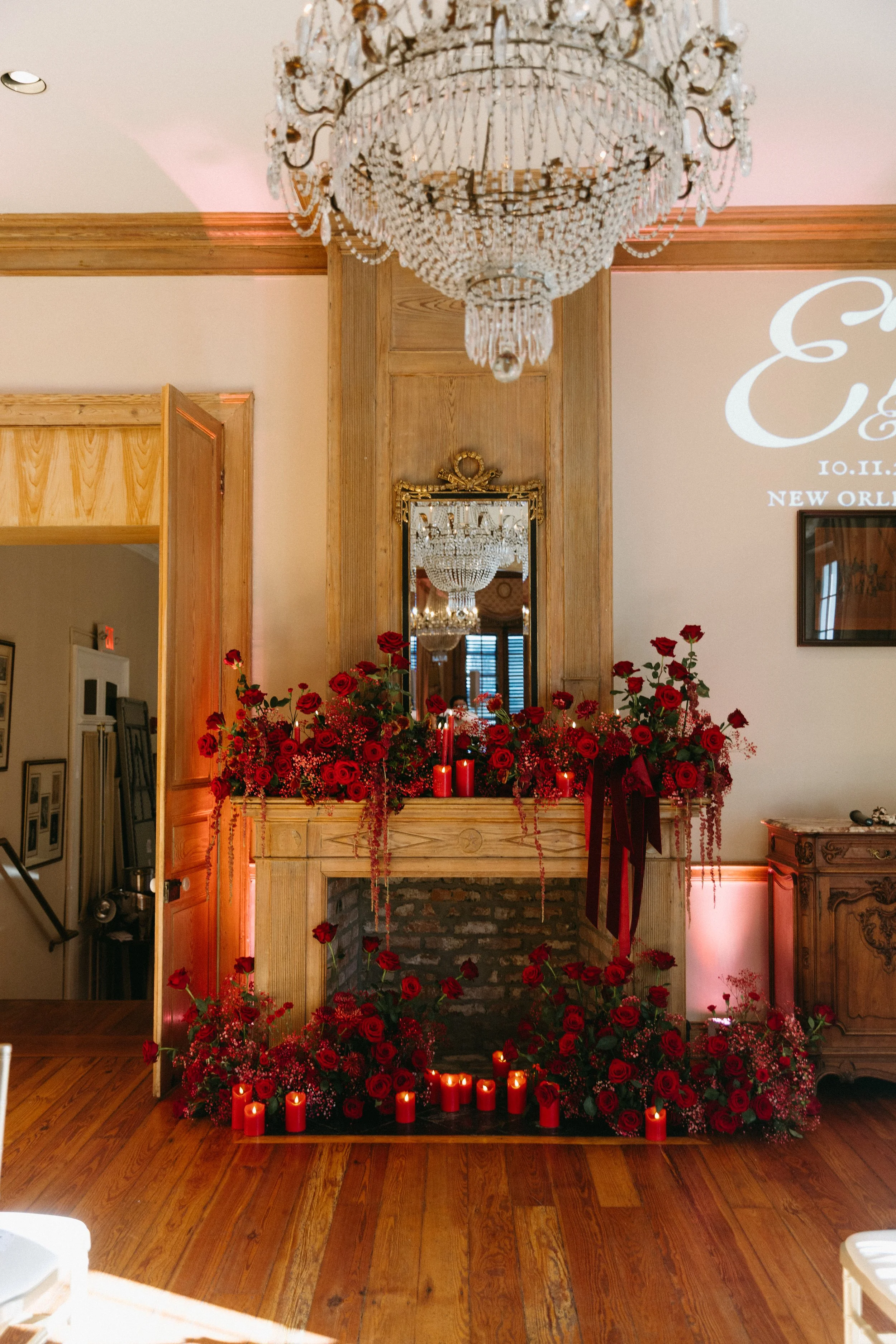 Red roses ceremony, fireplace mantle 