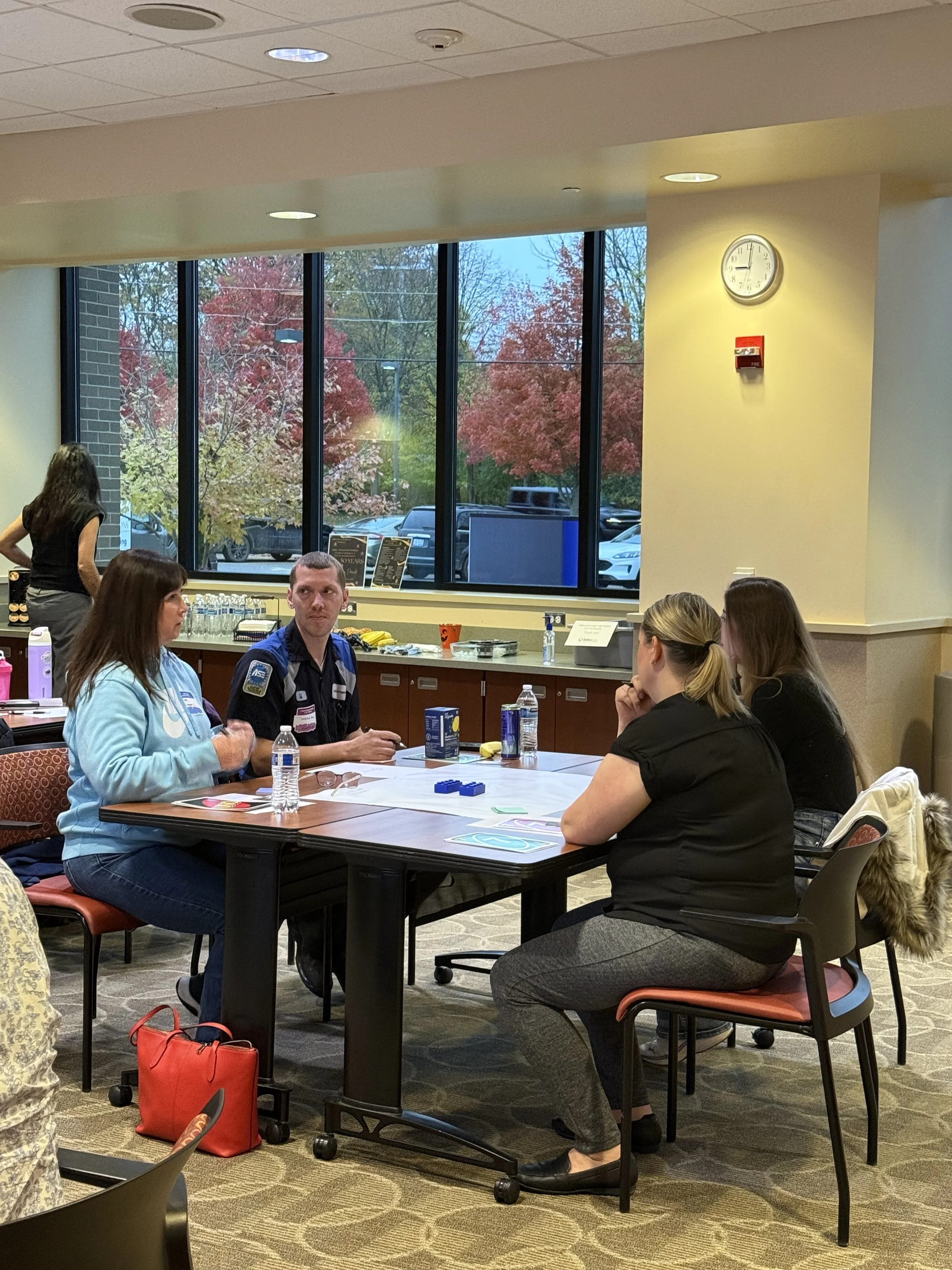 Small business engaged in a leadership session
