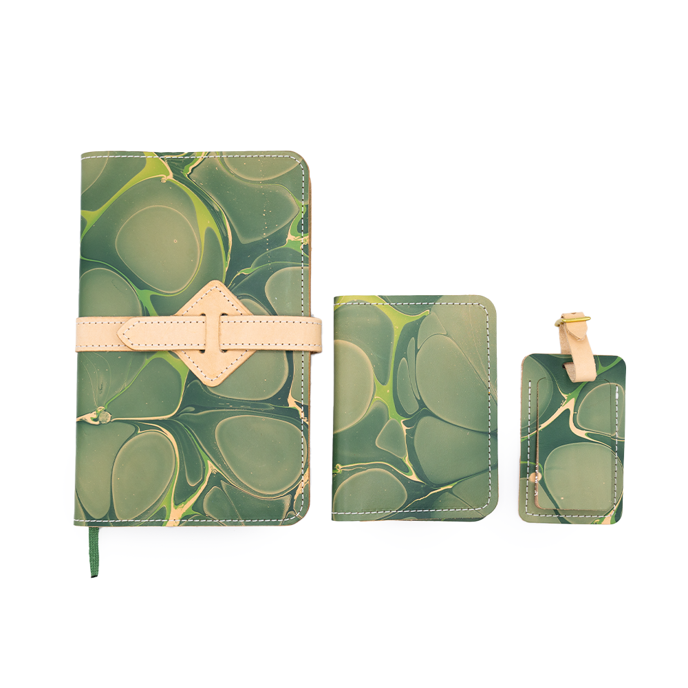 Green marbled leather travel set with notebook, passport holder, and luggage tag