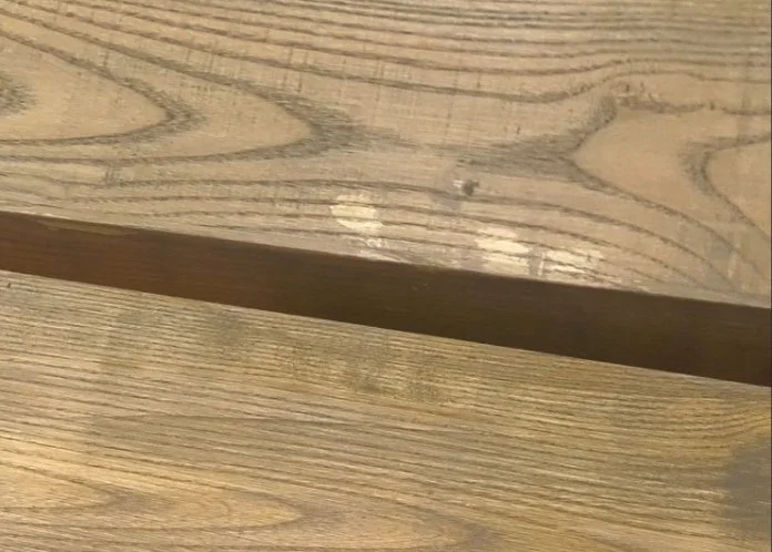 light blotches on a finished wood surface