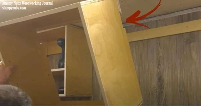 Notches all a cabinet to be flush with the wall while using the french cleat system.