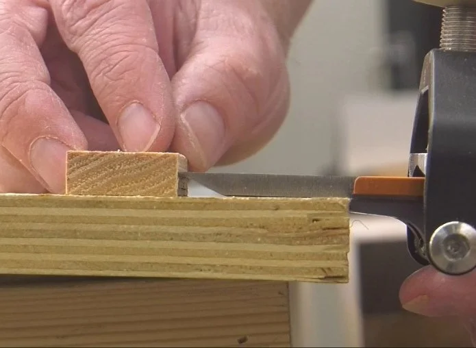 setting a wood stop block with the length of an angled plane iron