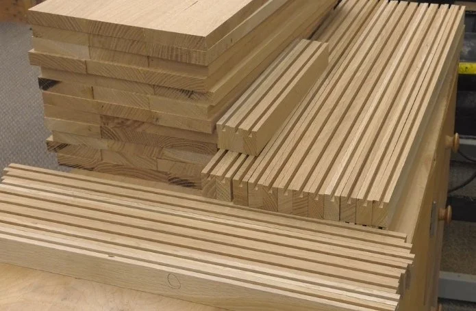 many wood pieces batched out for a project