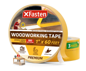 A roll of Double-Sided Woodworking Tape with a 3-pack of green painter's tape in front of it. The woodworking tape is labeled as 1 inch by 60 feet, double-sided, and designed for woodworking projects.