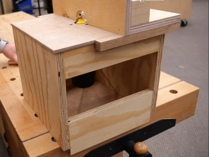 a diy router table with lower rail extension that hooks onto the edge of a table