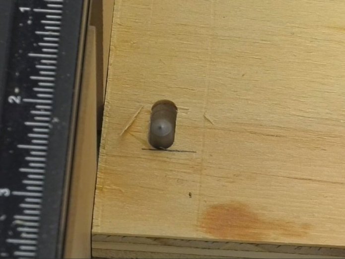 a slot started intentionally to the right of the end of the slot, moved back to the line indicating the end of the slot on the work piece