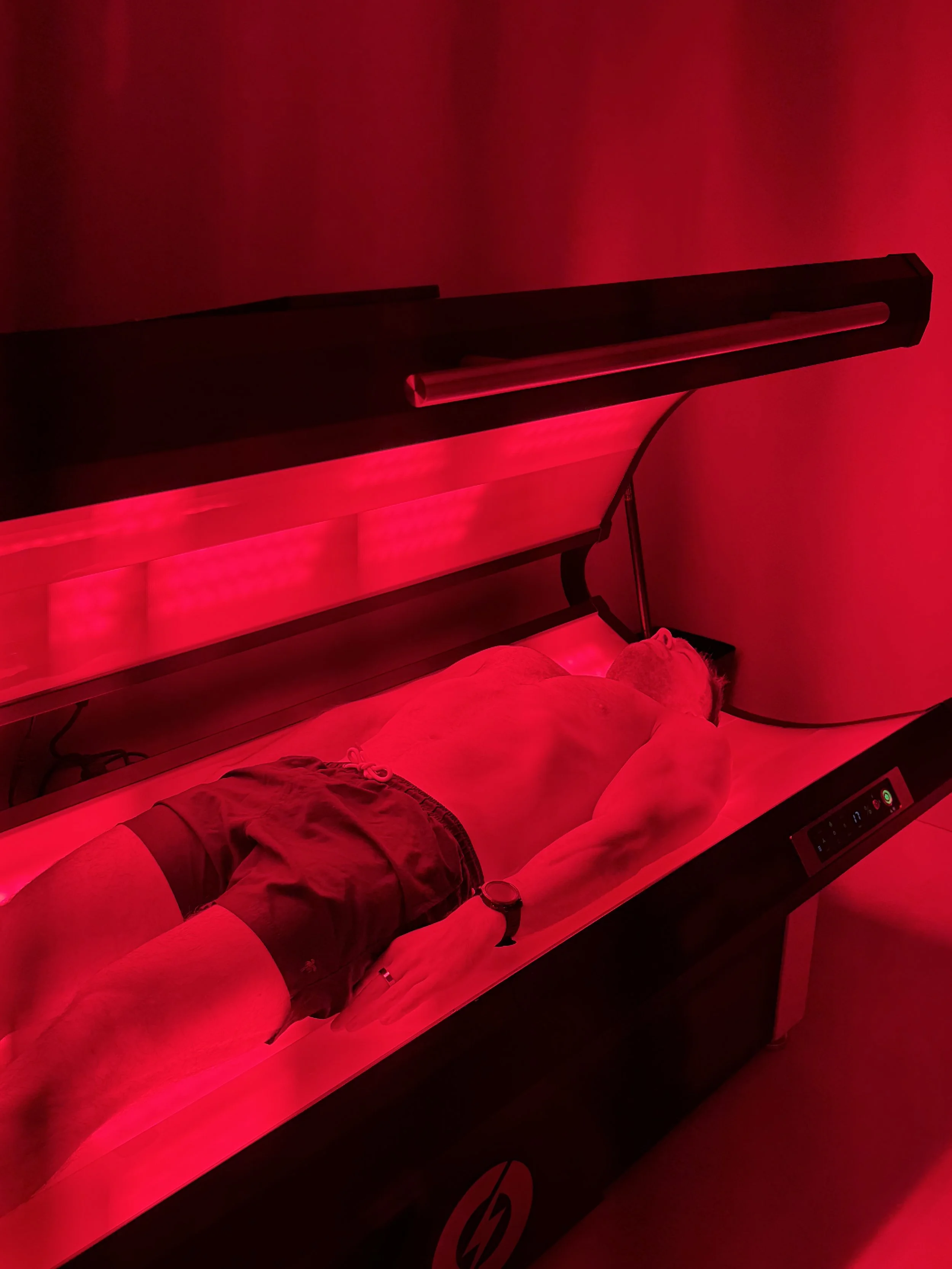 Full-body LED red light therapy panel delivering photobiomodulation to support skin health and recovery