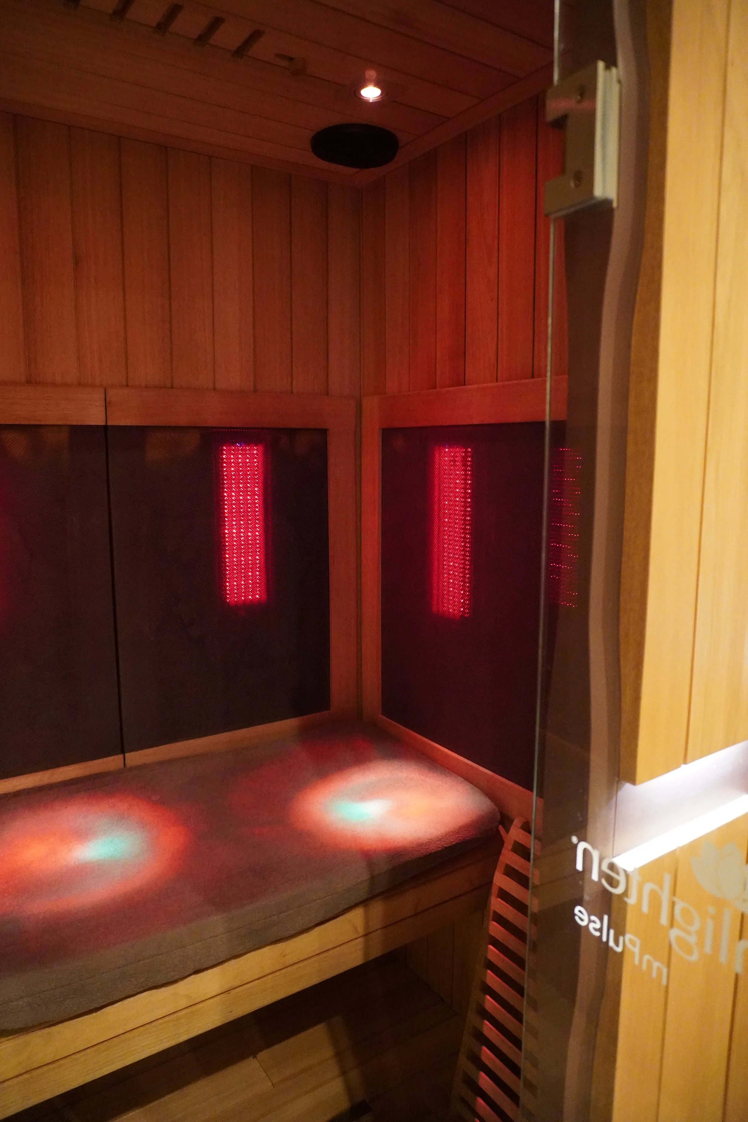 Sunlighten infrared sauna cabin with red light panels at ReGen Rooms wellness centre