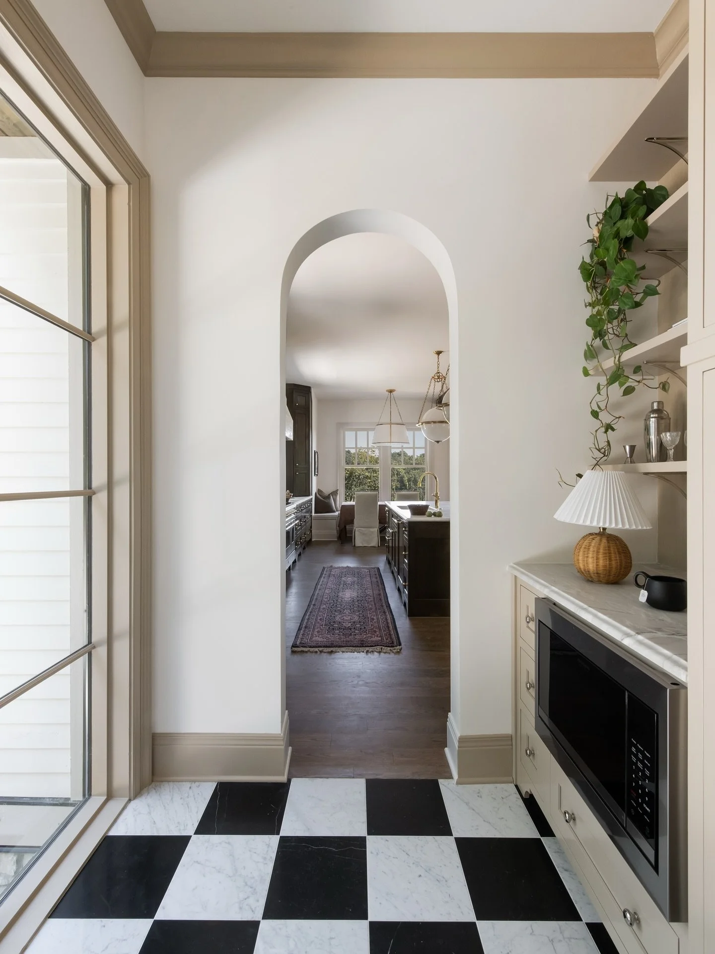 Not all pantries are created equal.

This isn&rsquo;t just storage, it&rsquo;s architecture meeting design in the most intentional way. From the honed marble countertops to the built-in microwave, custom shelving, and checkered marble floors, every d