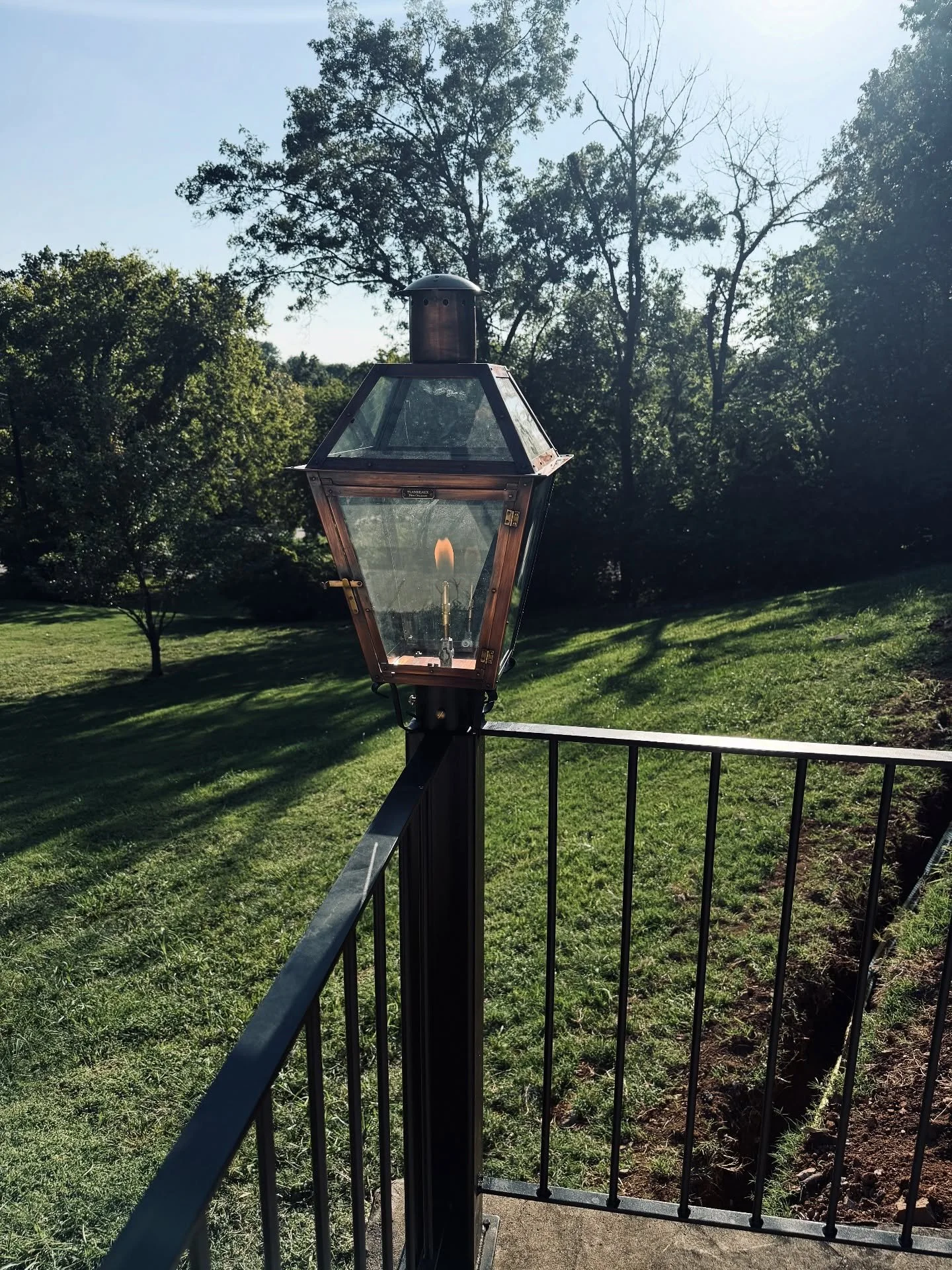 Gas lighting makes all the difference. Thanks to @stiltziron for the custom railing. #leverickhomes #nashville