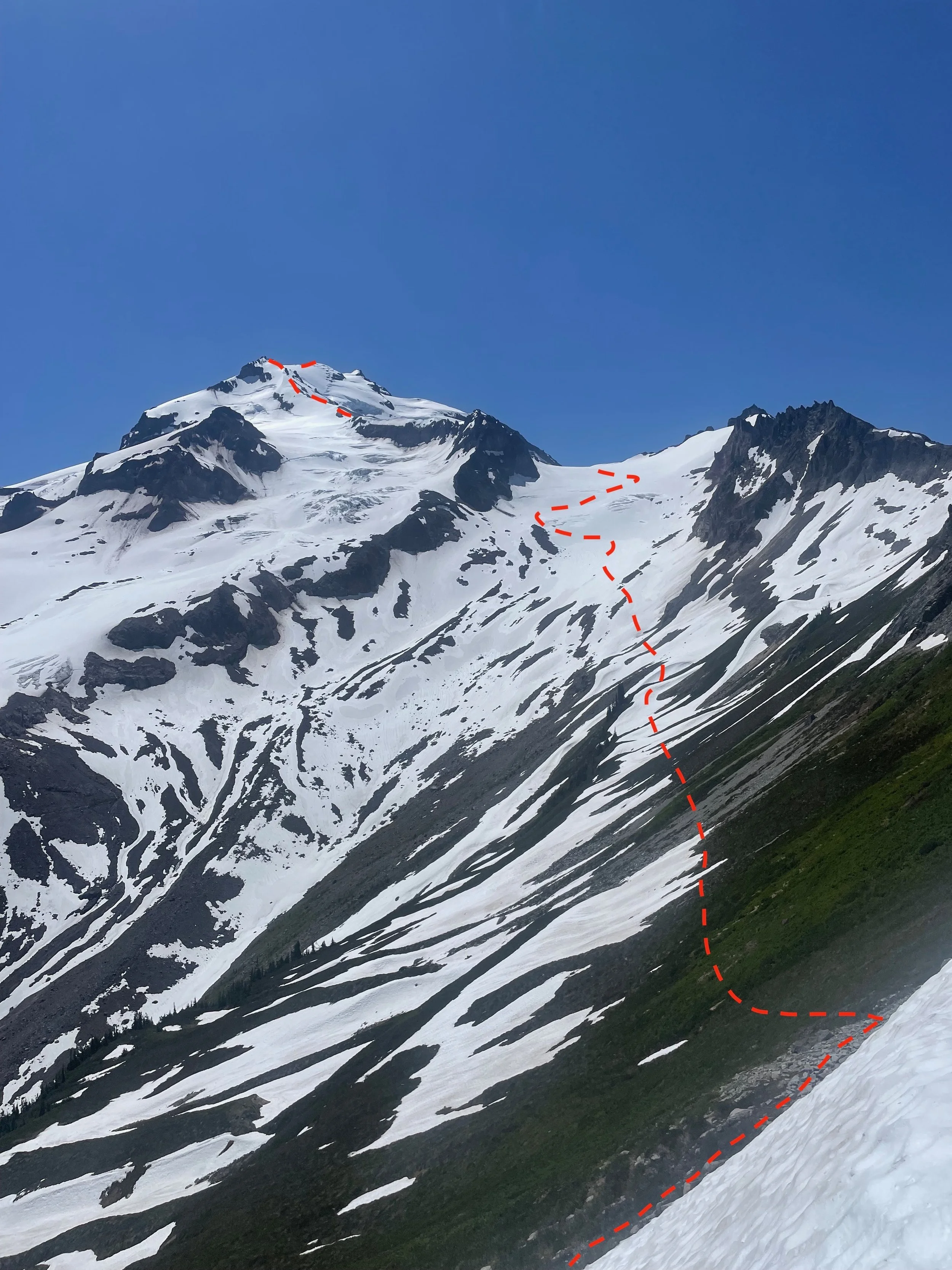   From the 6600' ridge crossing, traverse down and across towards that last stand of trees, loosing only 325'. High camp is the obvious saddle at the top of the Vista Glacier.  