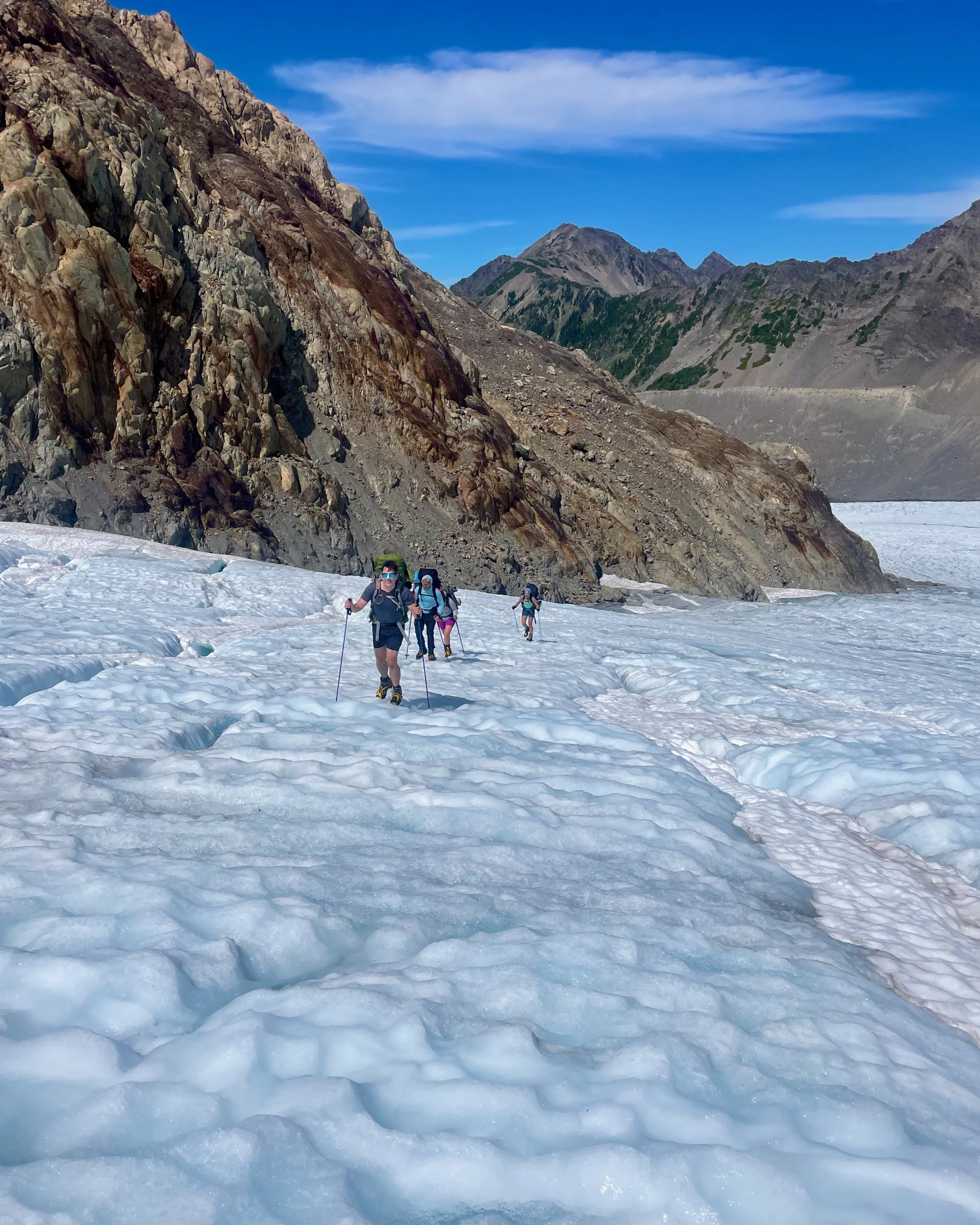   Crossing the lower Blue Glacier is easier with crampons. Because snow has completely melted away we can see all possible hazards and don't need a rope.  