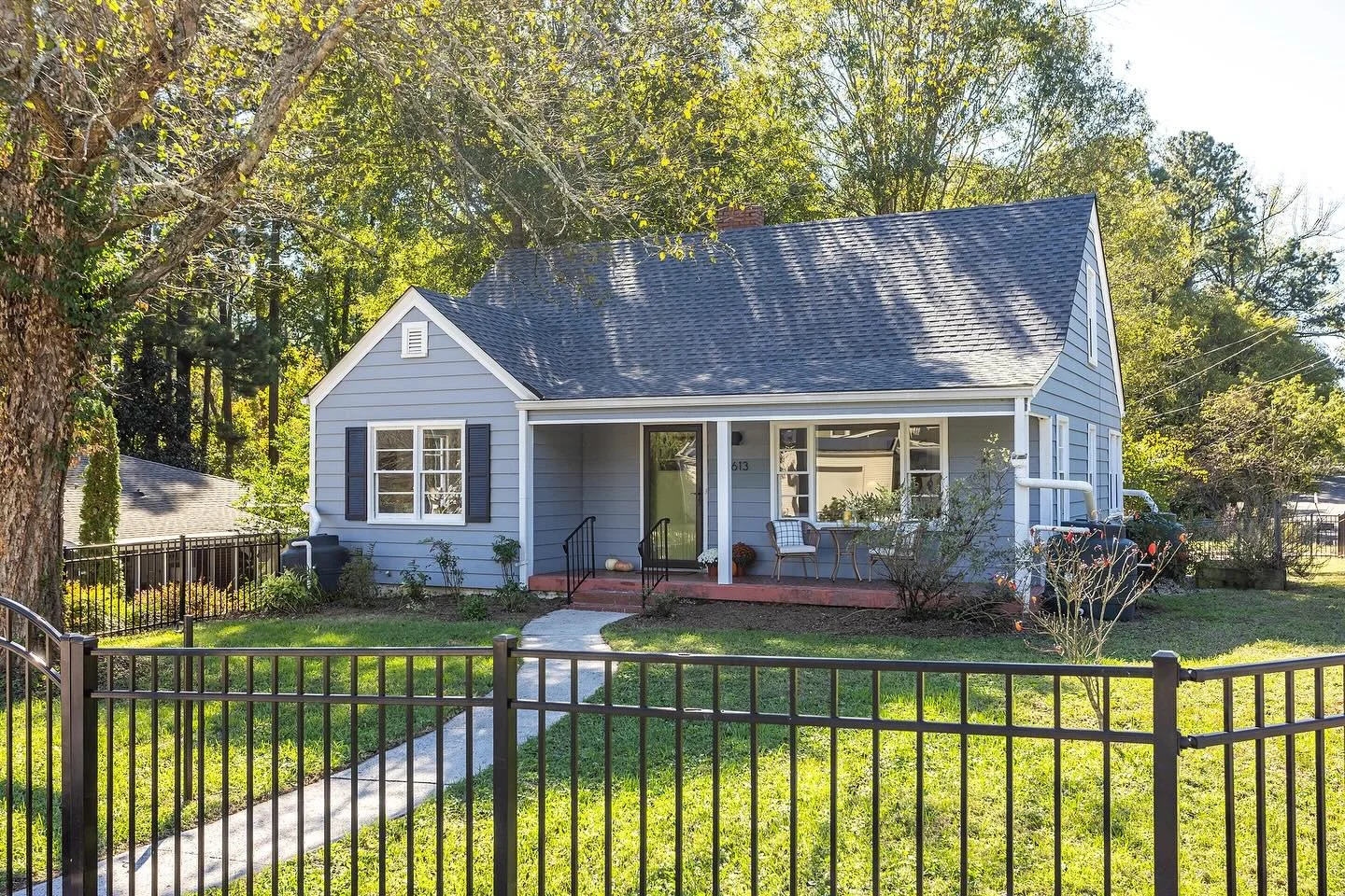 On a sunny corner lot between Lakewood and Forest Hills, this mid-century era Cape Cod blends character, charm, and a prime Durham location. Picture crisp autumn mornings on the front porch, waving to neighbors before starting your day. With a fenced