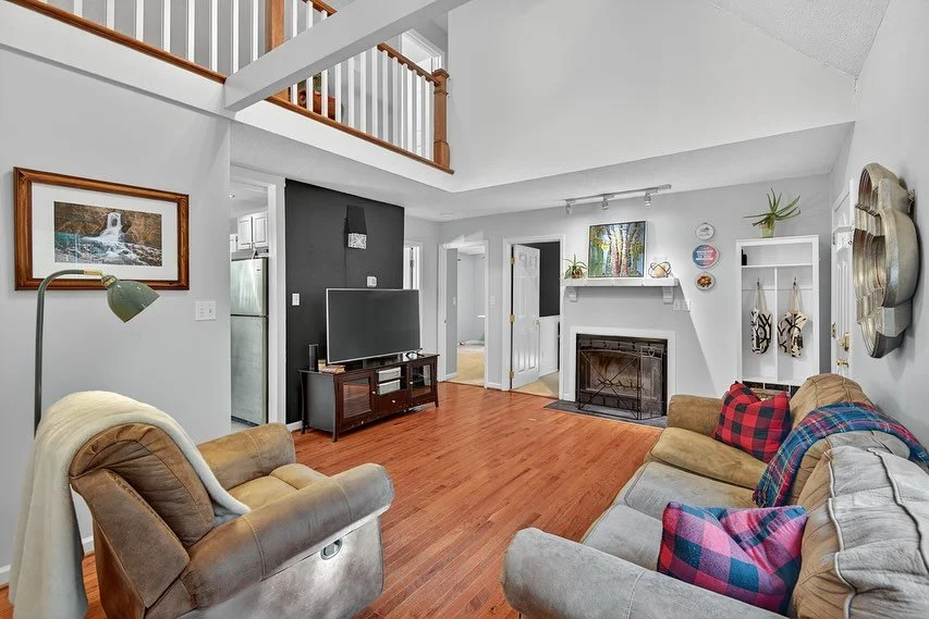 Tucked on a quiet street near RTP, this storybook Cape Cod offers character, comfort, and plenty of outdoor space. The large yard—complete with garden beds, multiple sheds, and a brand-new back deck—is perfect for relaxing or entertaining