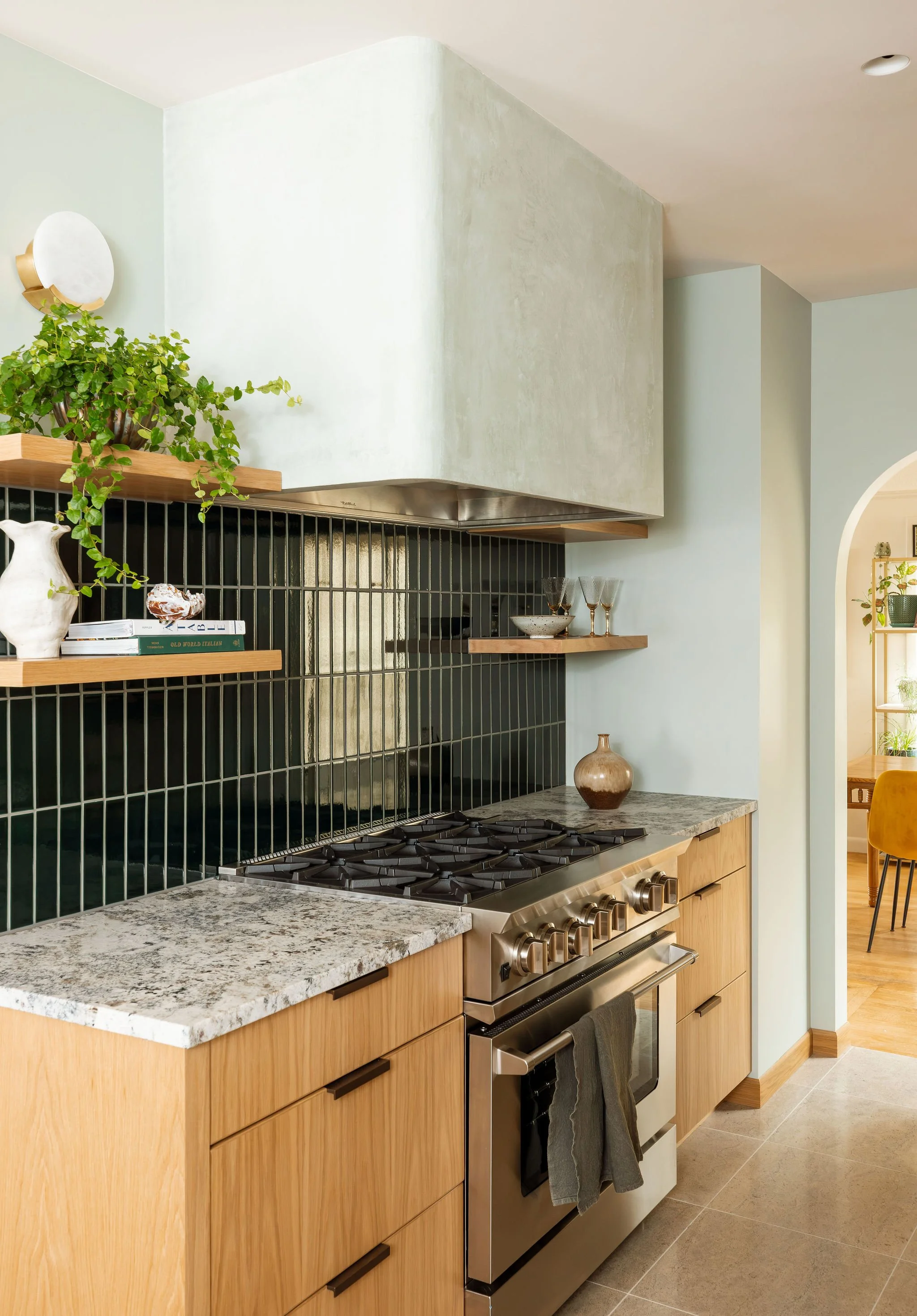 ModernOrganicKitchenRemodel_CurvedRangeHood.jpg