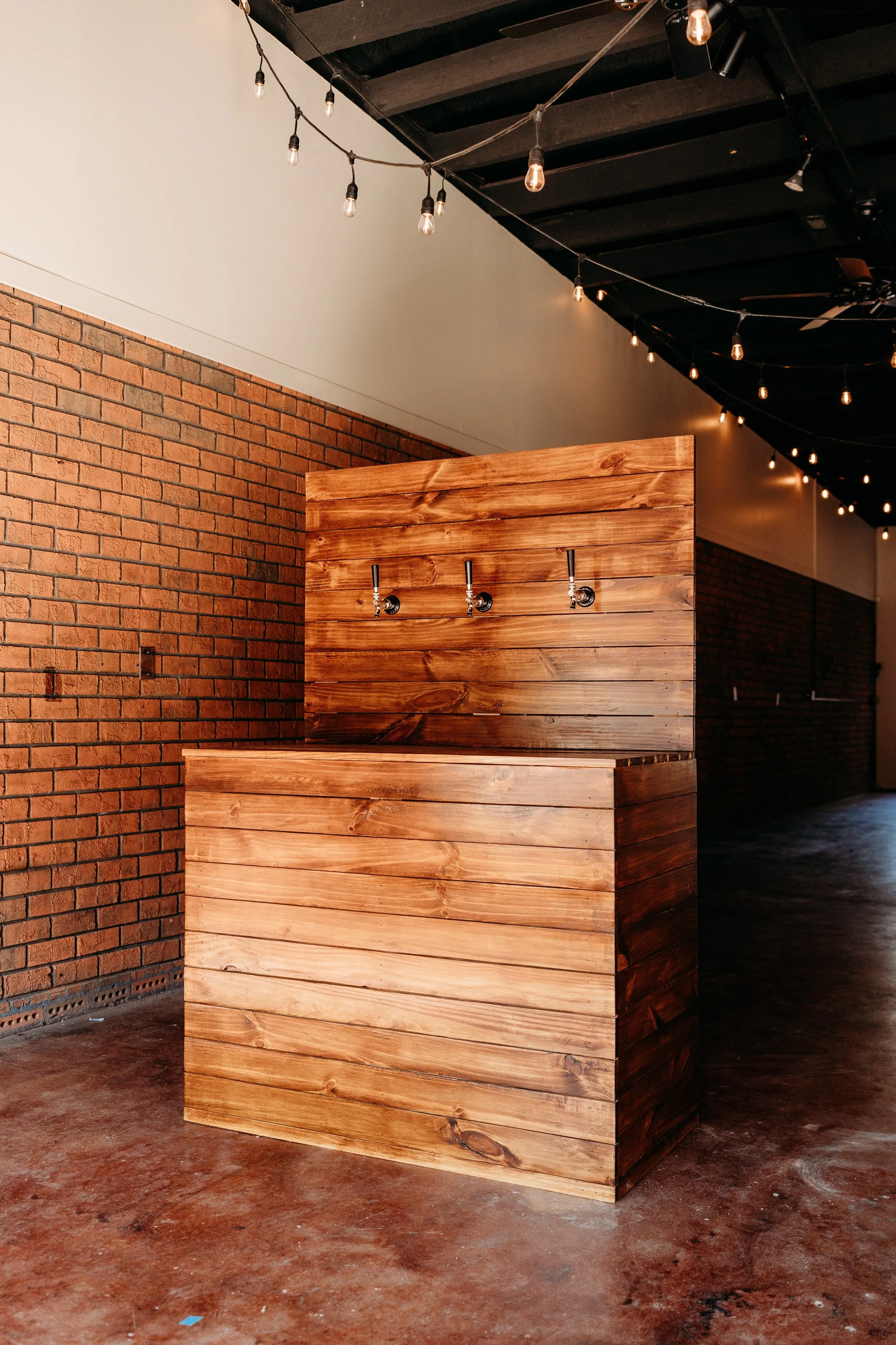 Draft beer keg box system with 3 tap handles. Custom built. Rustic wood appearance.