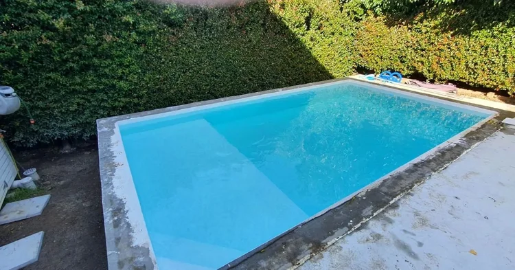 Fully tiled pool, turquoise blue water