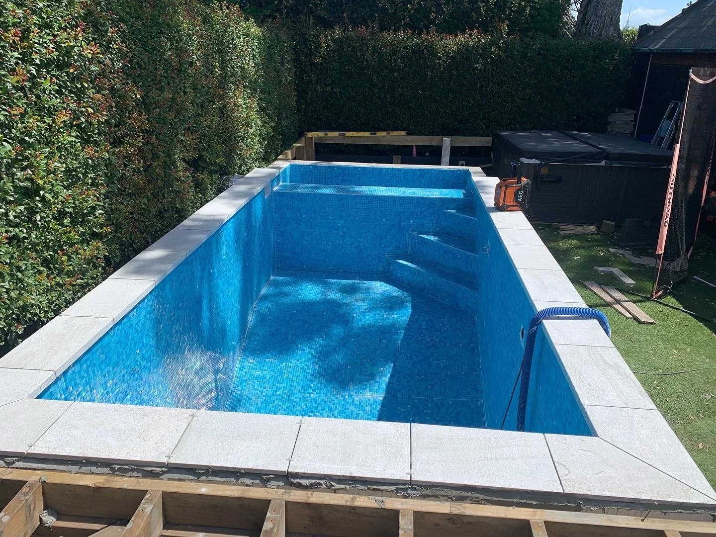 Fully tiled Diamond Pools swimming pool with Trend mosaic finish