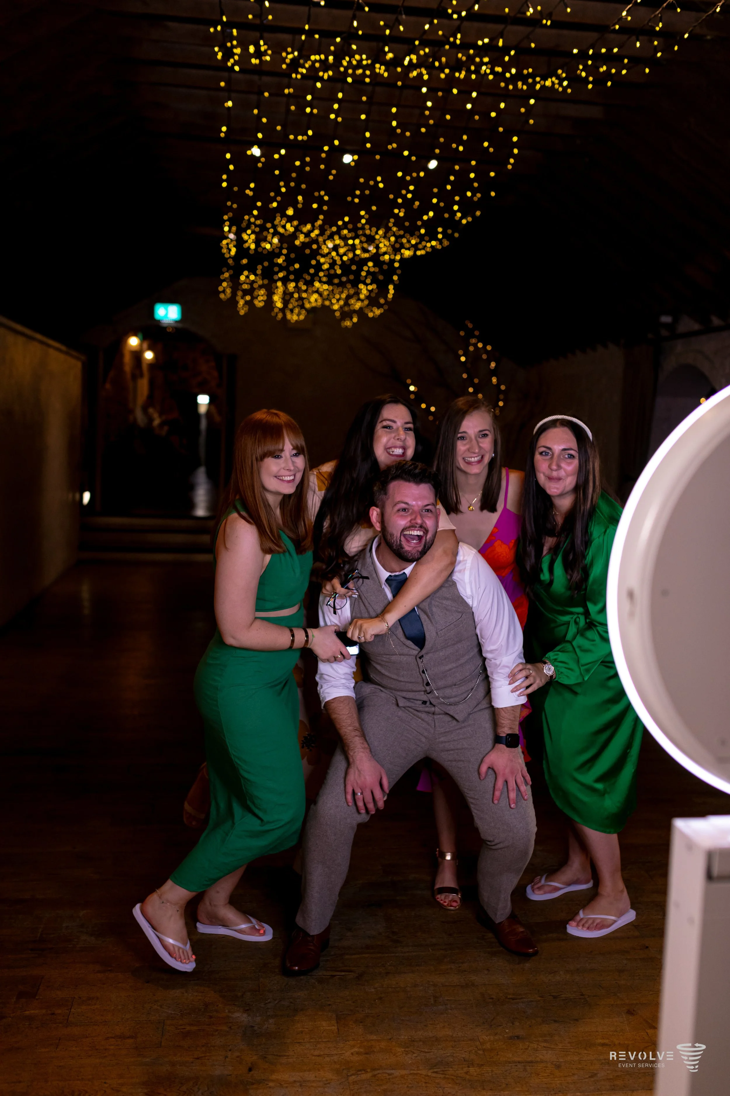 Guests using a selfie photo booth at a Toronto event