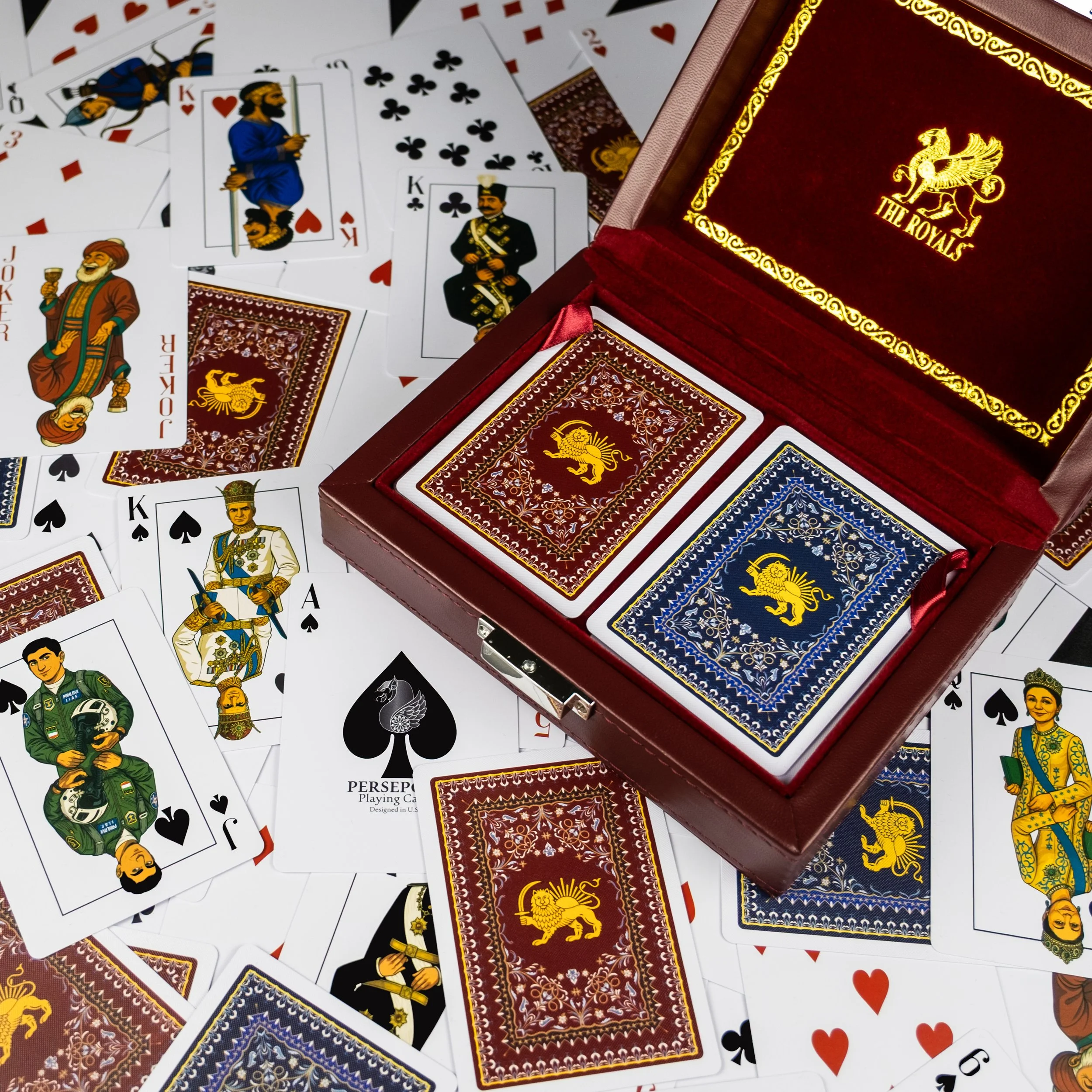 The Royals deck of Persian playing cards features the historic Lion and Sun symbol on the back cover over a Persian rug pattern