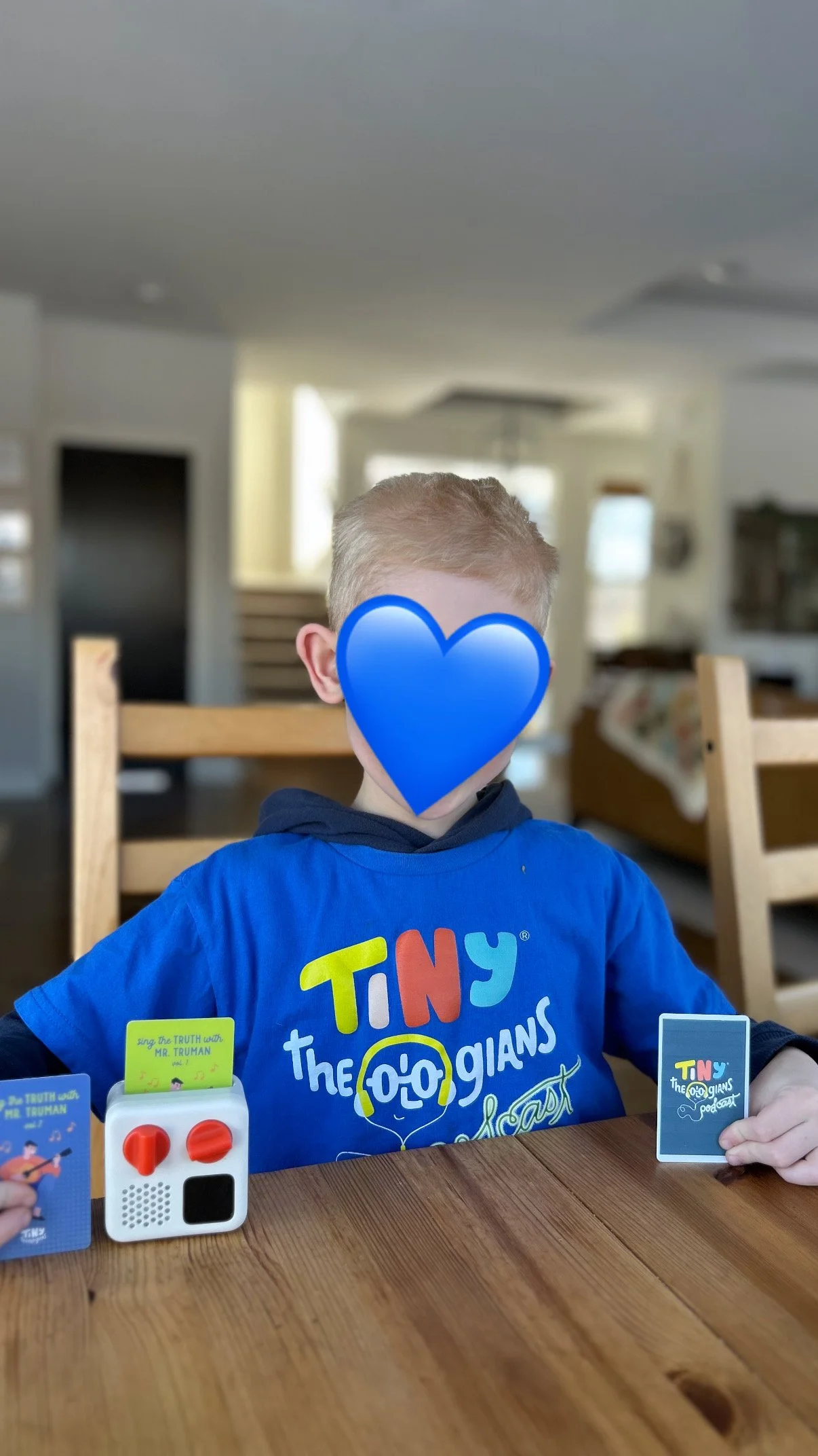 Child-with-tiny-theologians-yoto-cards-gear.JPG