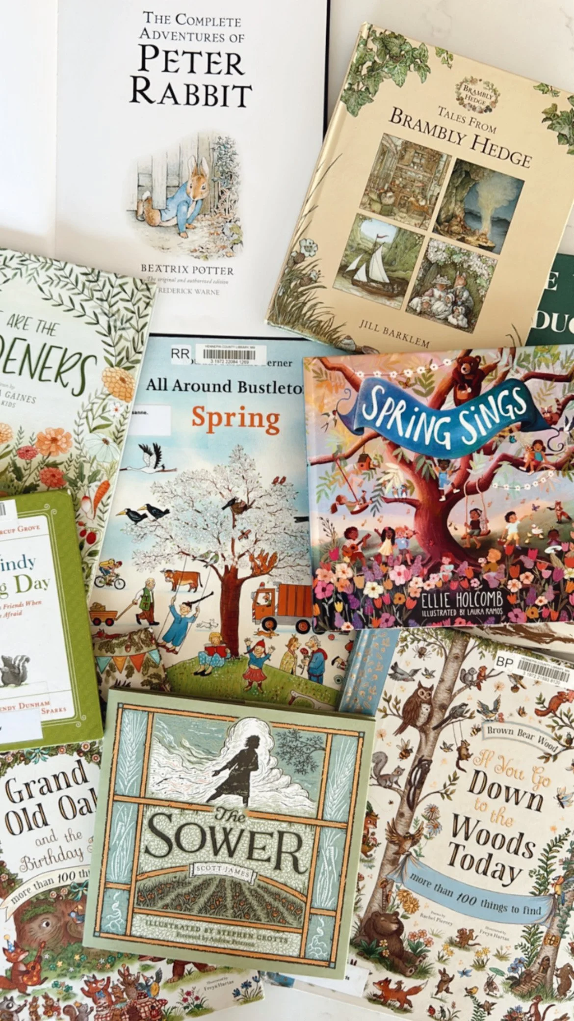 A collection of spring picture books for kids displayed together, featuring colorful seasonal stories for children.